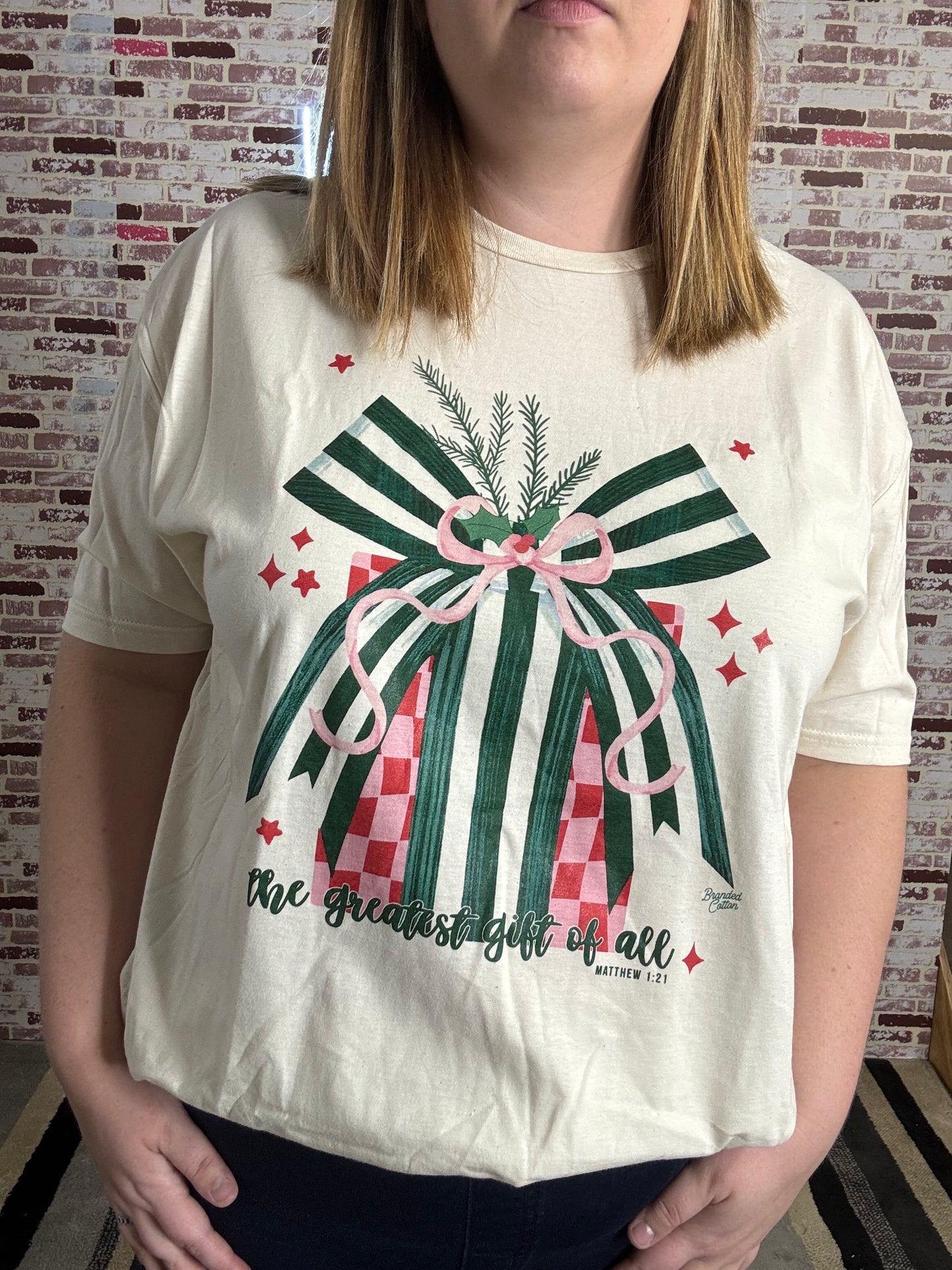 Christmas present with green bow graphic tee