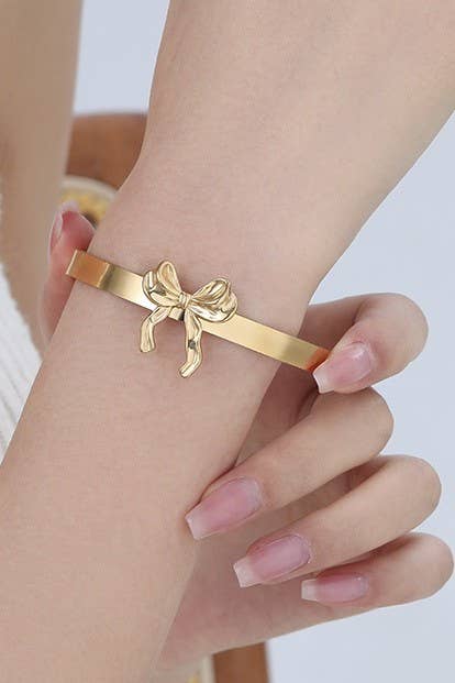 STAINLESS STEEL BOW CUFF BRACELET