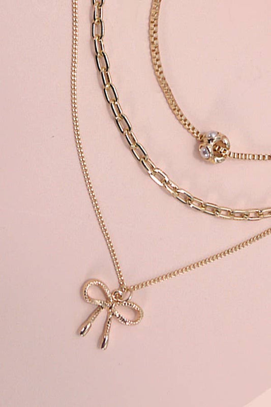 MULTI LAYER PEARL BOW NECKLACE