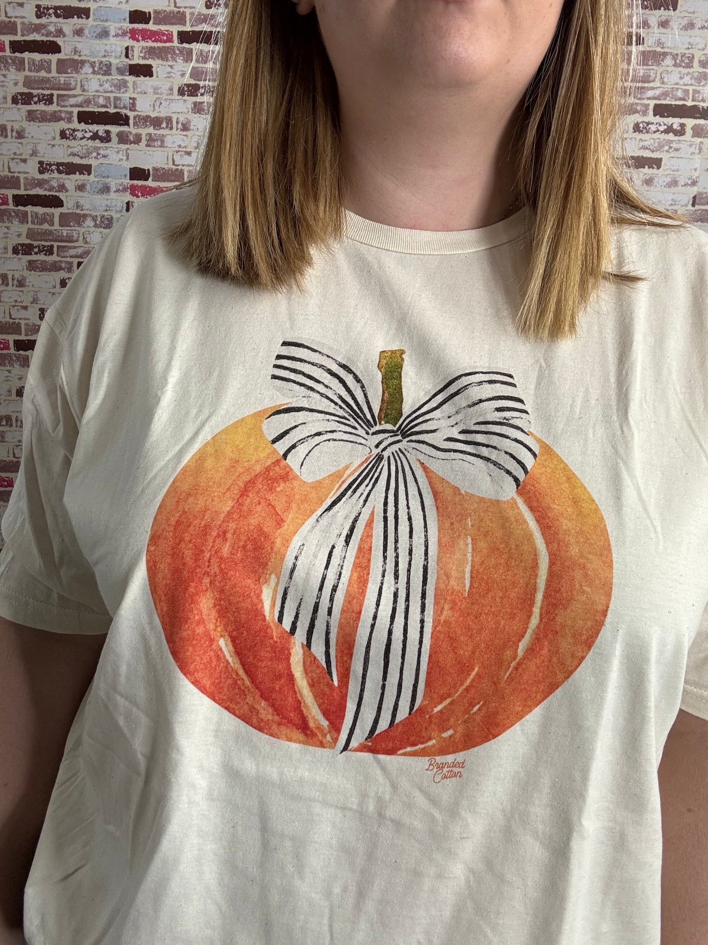 Pumpkin with bow graphic tee