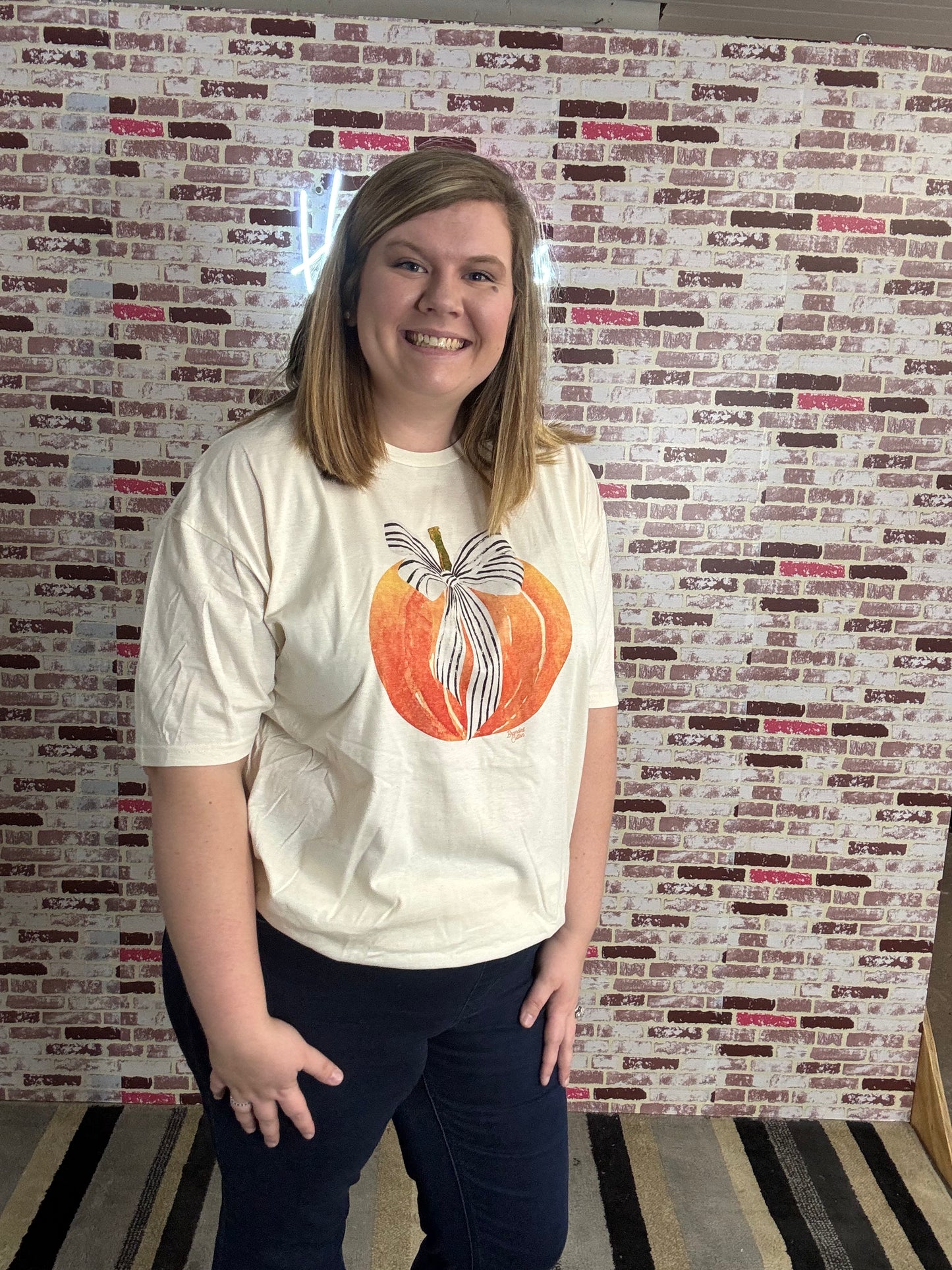 Pumpkin with bow graphic tee