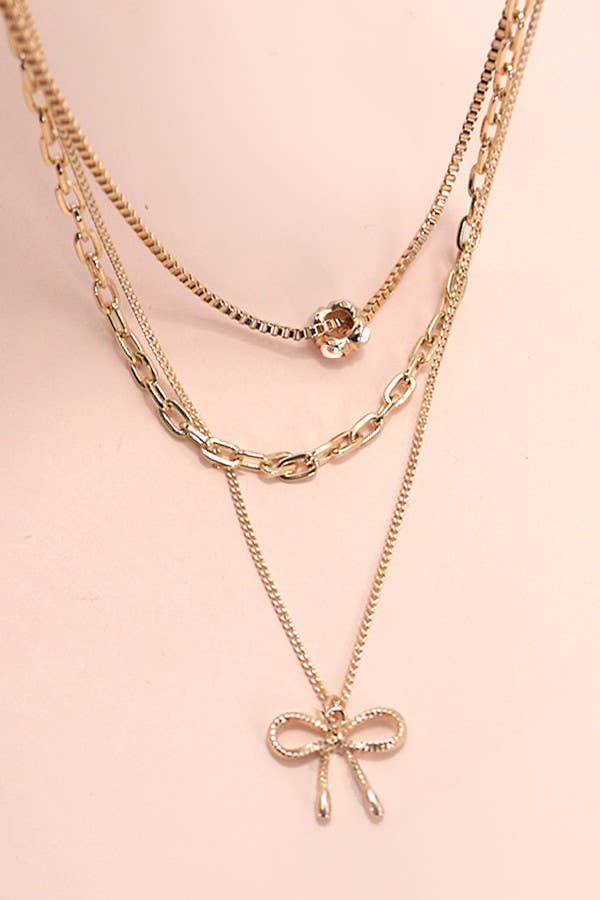 MULTI LAYER PEARL BOW NECKLACE